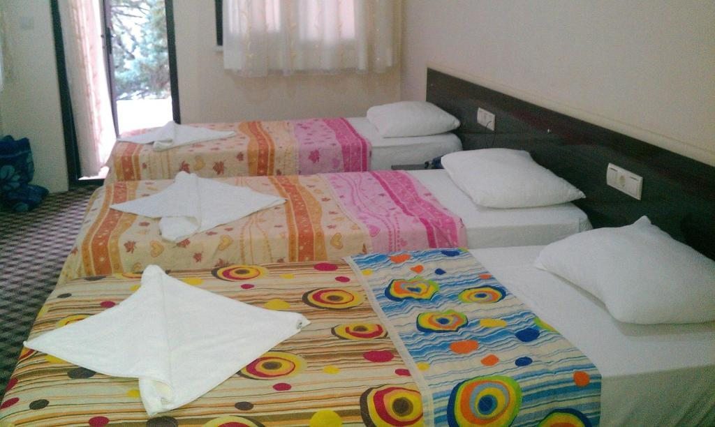 Четырехместный (Четырехместный номер эконом-класса с общей ванной комнатой) отеля Anatolia Hotel, Памуккале