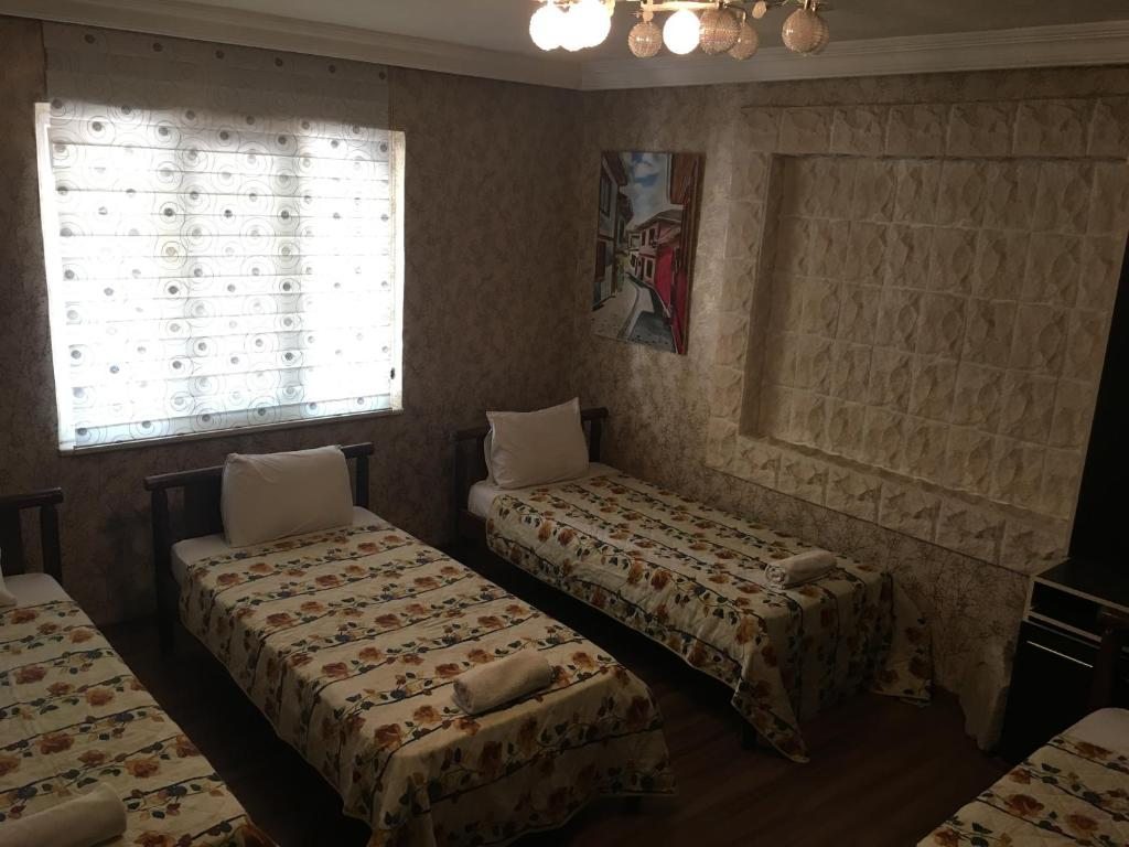 Двухместный (Двухместный номер с 2 отдельными кроватями и ванной комнатой) отеля Ozen Turku Pension, Памуккале