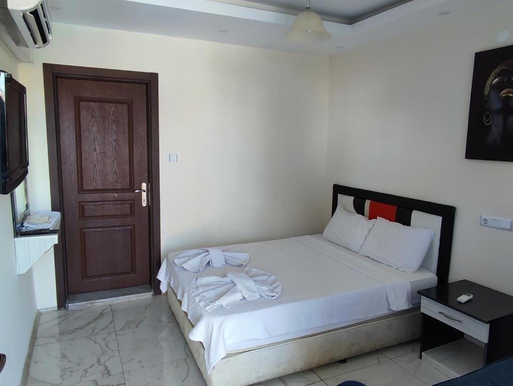 Двухместный (Стандартный двухместный номер с 1 кроватью или 2 отдельными кроватями) отеля Ozturk Hotel, Памуккале
