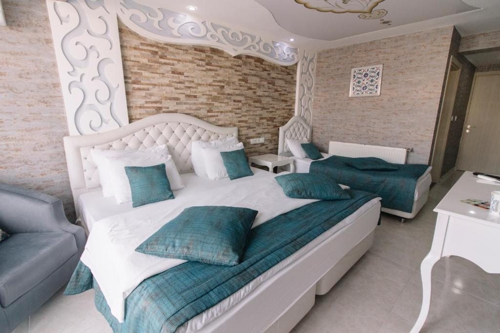 Двухместный (Двухместный номер с 2 отдельными кроватями) отеля Pamukkale Melrose Viewpoint Suites, Памуккале