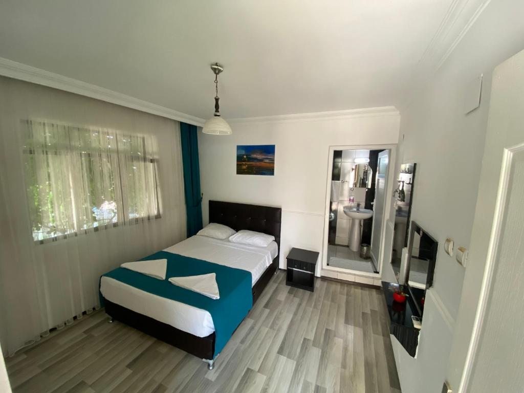 Двухместный (Стандартный двухместный номер с 2 отдельными кроватями) гостевого дома Sunrise Aya Hotel, Памуккале