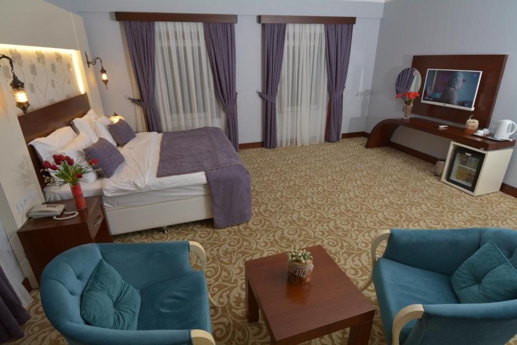 Двухместный (Двухместный номер Делюкс с 1 кроватью) отеля White Heaven Hotel, Памуккале