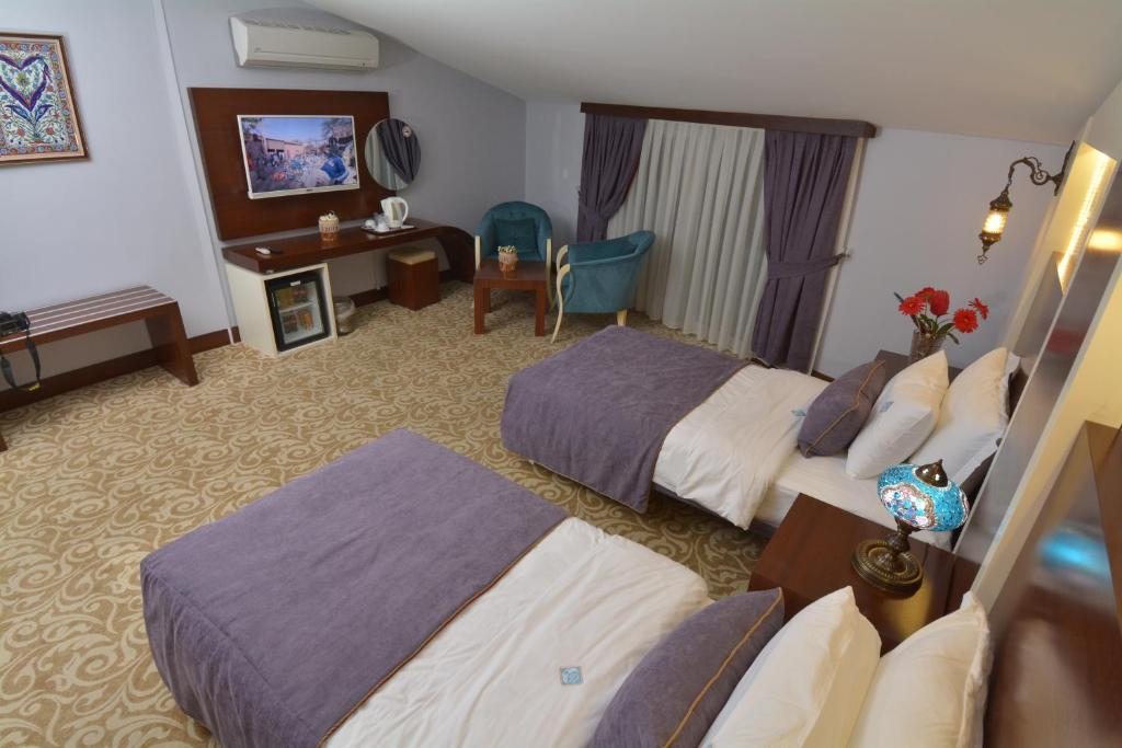 Двухместный (Двухместный номер с 2 отдельными кроватями и балконом) отеля White Heaven Hotel, Памуккале