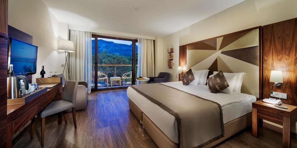 Двухместный (Стандартный двухместный номер с 1 кроватью или 2 отдельными кроватями) курортного отеля Nirvana Lagoon Villas Suites & Spa, Бельдиби