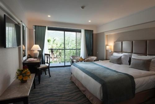 Двухместный (Стандартный двухместный номер с 1 кроватью или 2 отдельными кроватями и видом на горы) курортного отеля Rixos Beldibi, Бельдиби