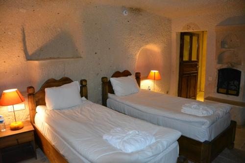 Двухместный (Представительский номер в виде пещеры) отеля Aden Hotel Cappadocia, Учхисар