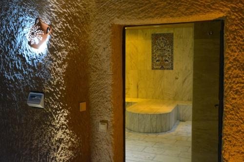 Трехместный (Трехместный представительский номер «Пещера») отеля Aden Hotel Cappadocia, Учхисар