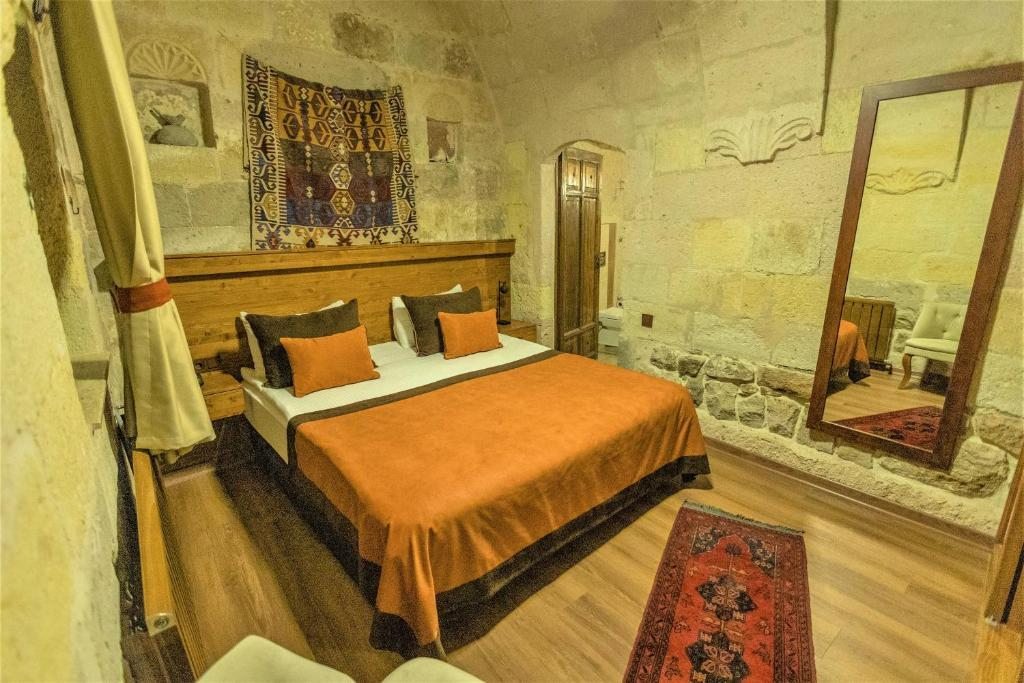 Сьюит (Отделанный камнем суперлюкс) отеля Aşk-ı Derun Hotel, Учхисар