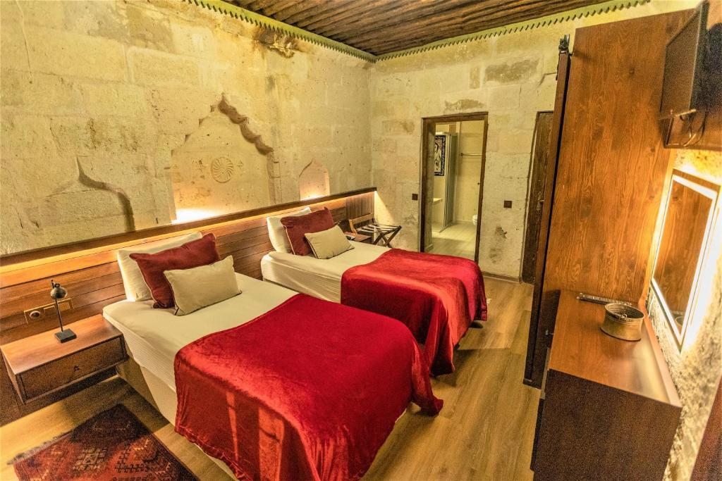 Семейный (Семейный люкс с 2 спальнями) отеля Aşk-ı Derun Hotel, Учхисар