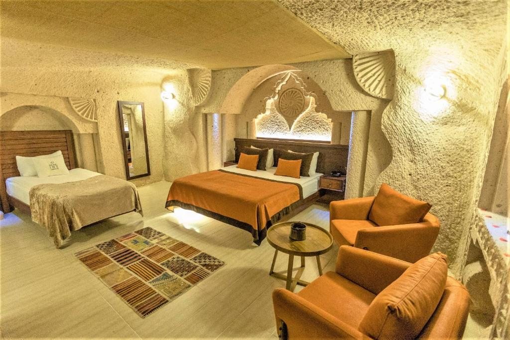 Двухместный (Люкс «Пещера» с гидромассажной ванной для новобрачных) отеля Aşk-ı Derun Hotel, Учхисар