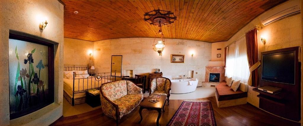 Двухместный (Двухместный номер Делюкс с 1 кроватью) курортного отеля Cappadocia Cave (CCR), Учхисар