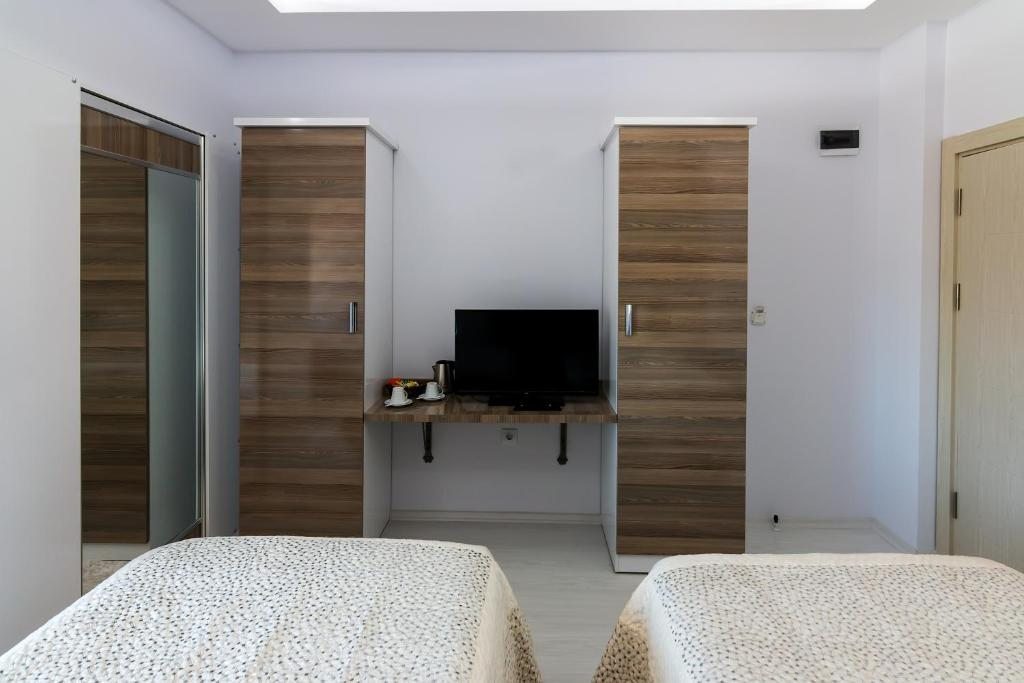 Двухместный (Стандартный двухместный номер с 2 отдельными кроватями) отеля Cappadocia Symbol Hotel Uçhisar, Учхисар