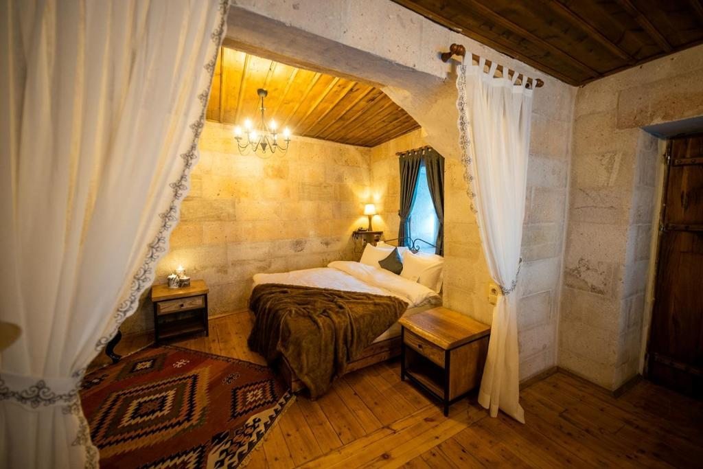 Сьюит (Люкс с кроватью размера «king-size») отеля Duven Hotel Cappadocia, Учхисар