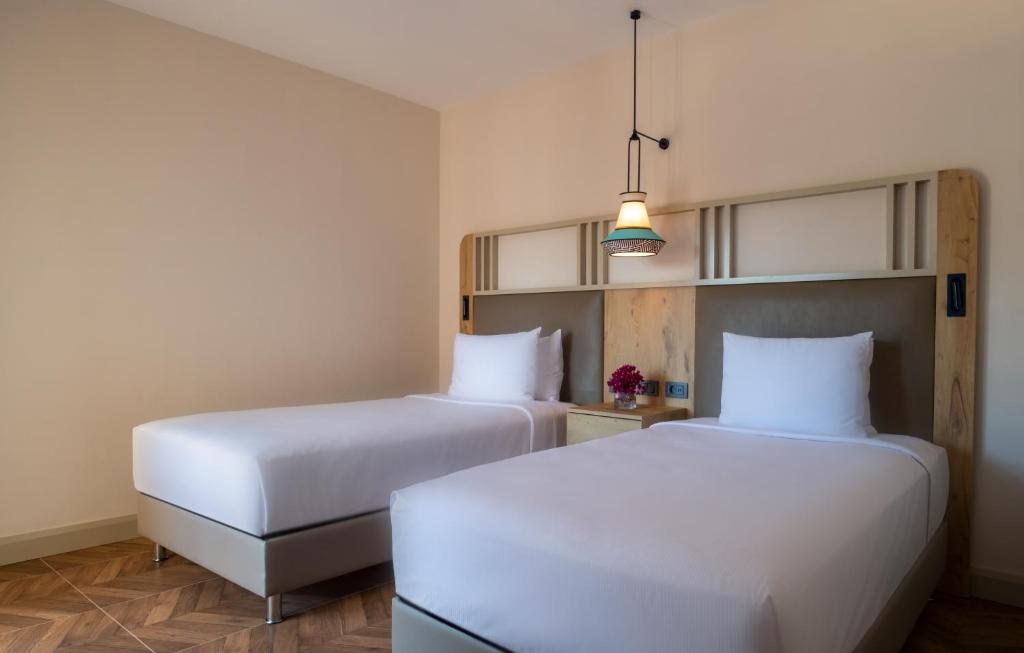 Двухместный (Смежный двухместный номер с 2 отдельными кроватями) курортного отеля Isil Club Bodrum, Торба