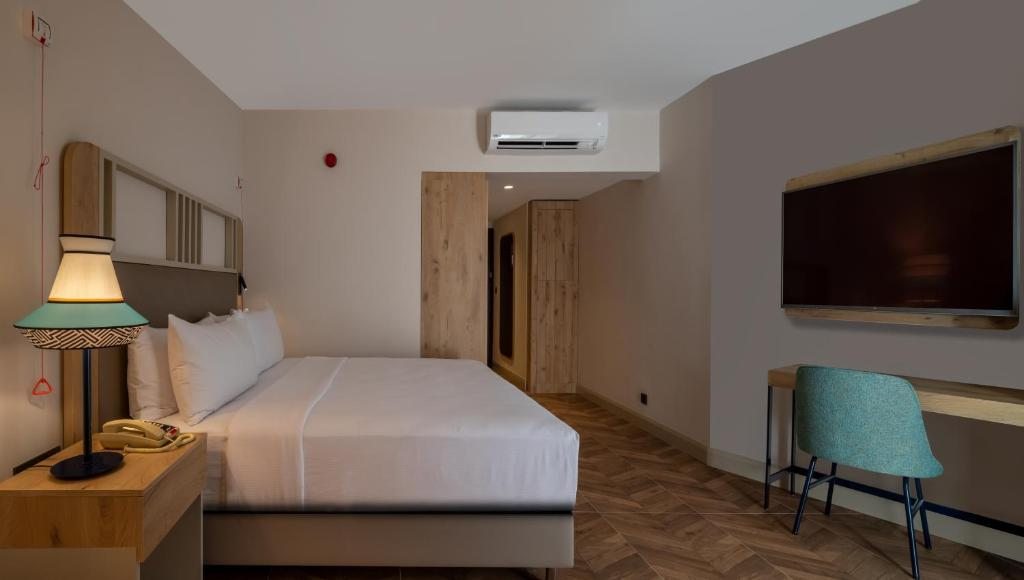 Трехместный (Номер с кроватью размера «king-size» — Подходит для гостей с ограниченными физическими возможностями) курортного отеля Isil Club Bodrum, Торба