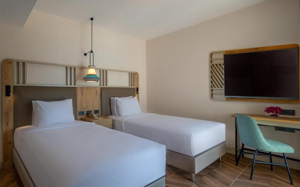 Двухместный (Двухместный номер с 2 отдельными кроватями) курортного отеля Isil Club Bodrum, Торба
