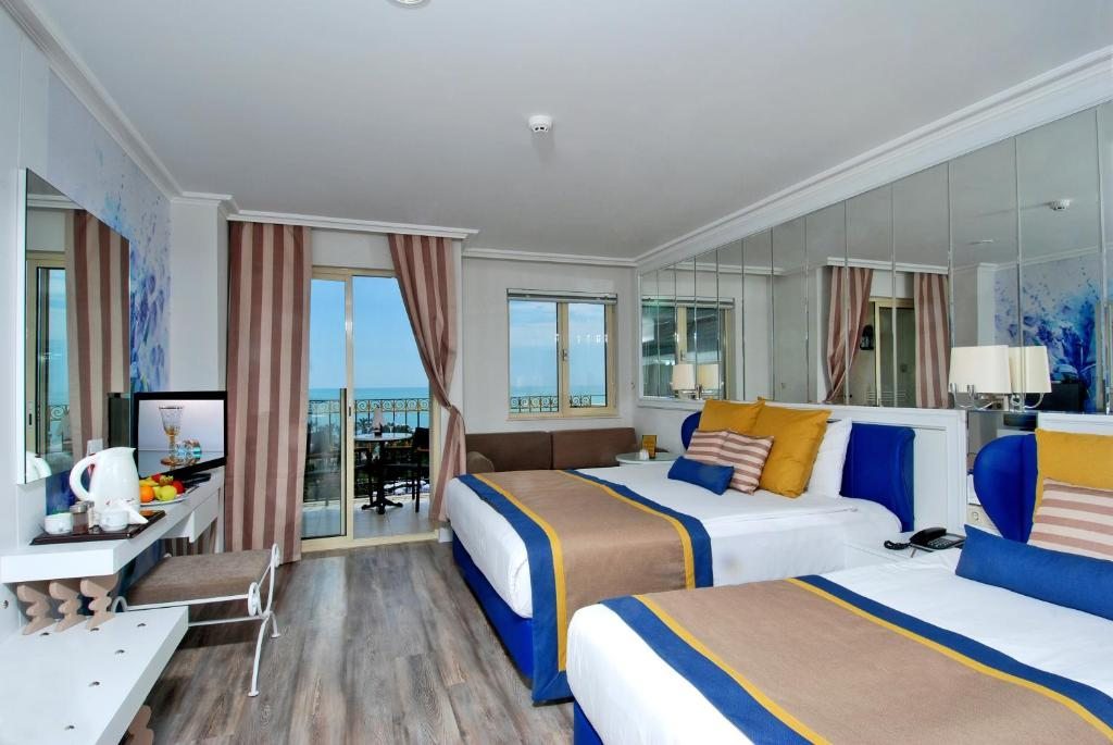 Двухместный (Стандартный двухместный номер с 1 кроватью или 2 отдельными кроватями и боковым видом на море) курортного отеля Delphin Diva, Лара
