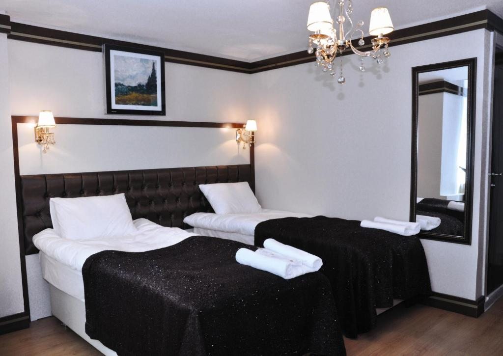 Двухместный (Двухместный номер Делюкс с 1 кроватью или 2 отдельными кроватями) отеля Gloria Tibi, Самсун