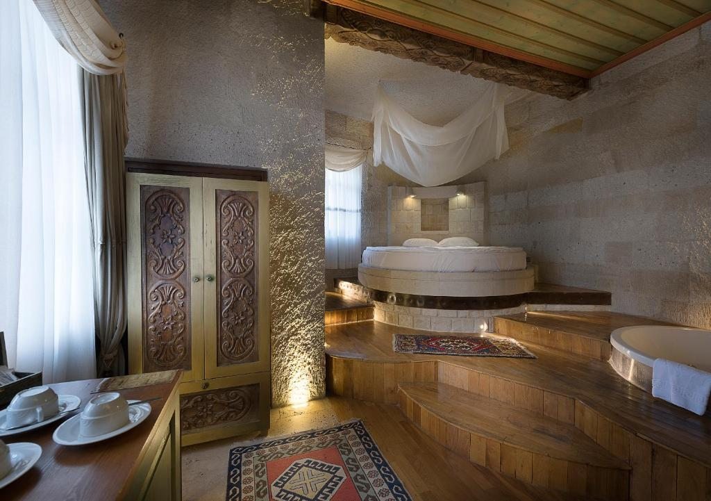 Сьюит (Королевский люкс в пещере) отеля Anatolian Houses, Гереме