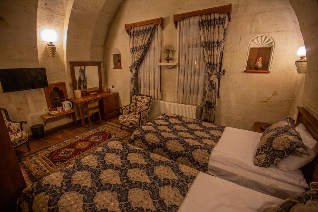 Двухместный (Стандартный двухместный номер с 2 отдельными кроватями) отеля Stone House Cave Hotel, Гереме