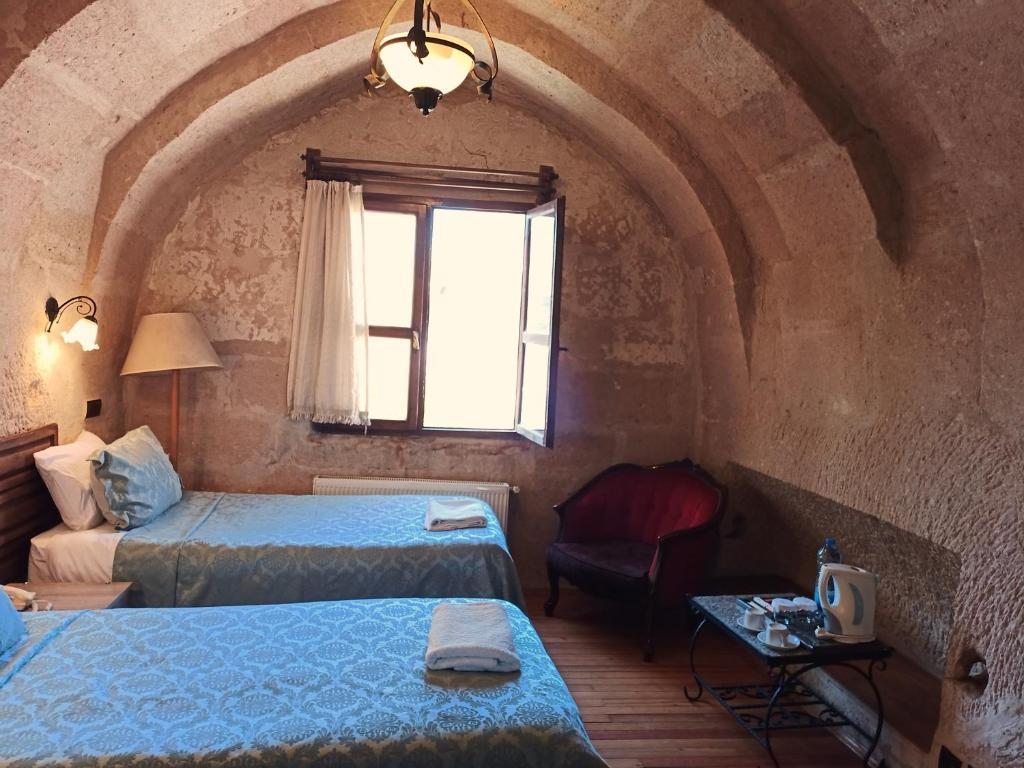 Двухместный (Двухместный номер с 2 отдельными кроватями и душем) отеля Göreme Ascension Cave Suites, Гереме