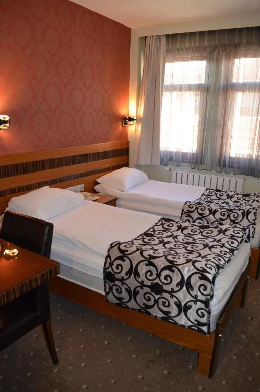 Двухместный (Стандартный двухместный номер с 2 отдельными кроватями) отеля Atlas, Бурса