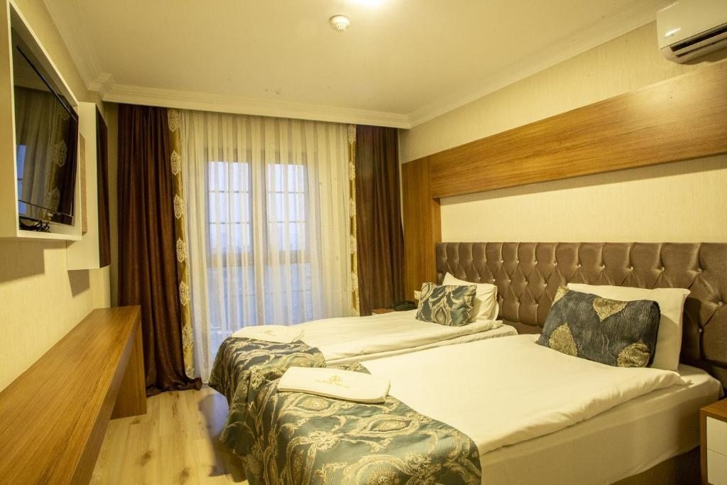 Двухместный (Стандартный двухместный номер с 1 кроватью или 2 отдельными кроватями) отеля Bursa Palas Hotel, Бурса
