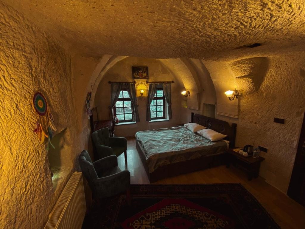Двухместный (Улучшенный двухместный номер с 1 кроватью) отеля Lalezar Cave Hotel, Гереме