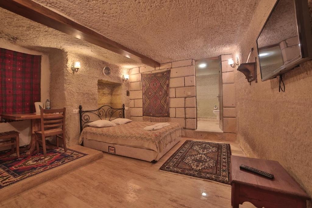 Двухместный (Двухместный номер «Пещера» - нижний этаж) отеля Local Cave House Hotel, Гереме