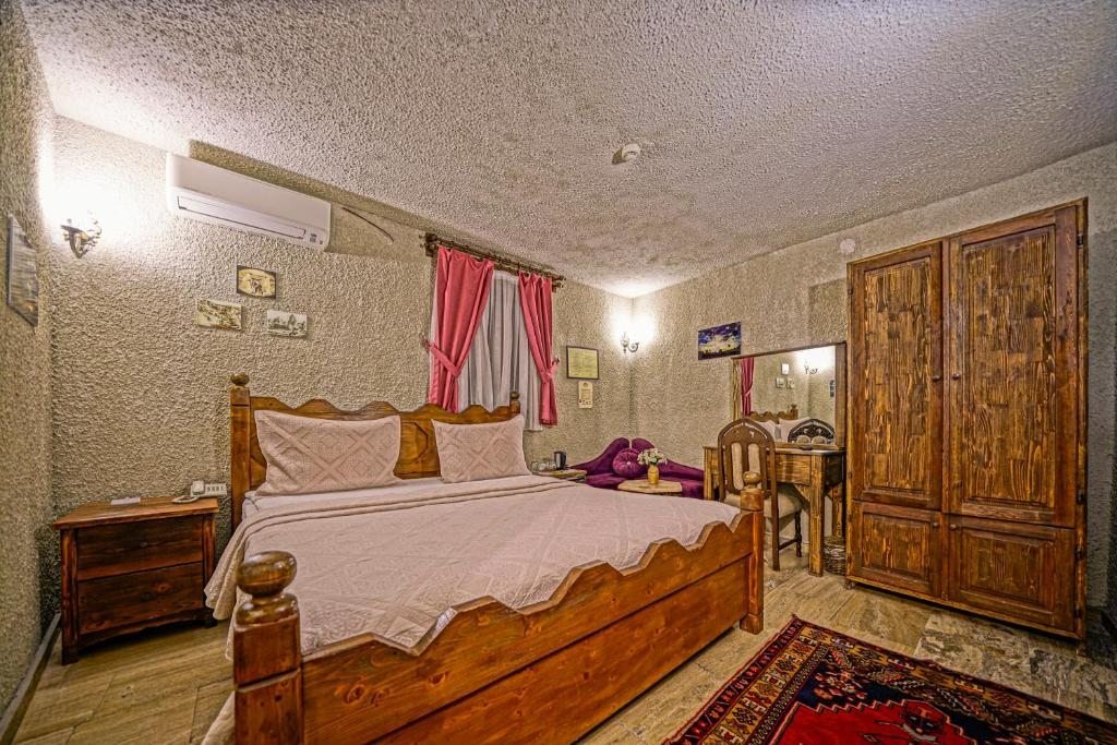 Двухместный (Улучшенный каменный номер) отеля Maccan Cave Hotel, Гереме