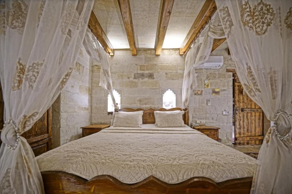 Двухместный (Каменный двухместный номер Делюкс с 1 кроватью) отеля Maccan Cave Hotel, Гереме