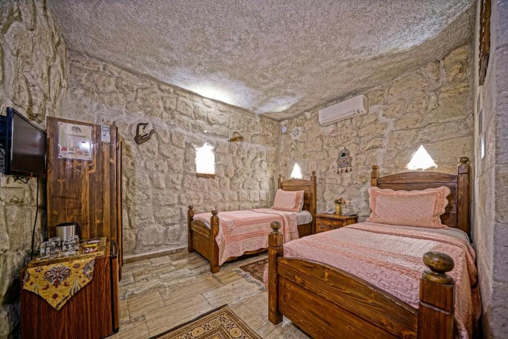 Двухместный (Двухместный номер Стоун с 2 отдельными кроватями) отеля Maccan Cave Hotel, Гереме