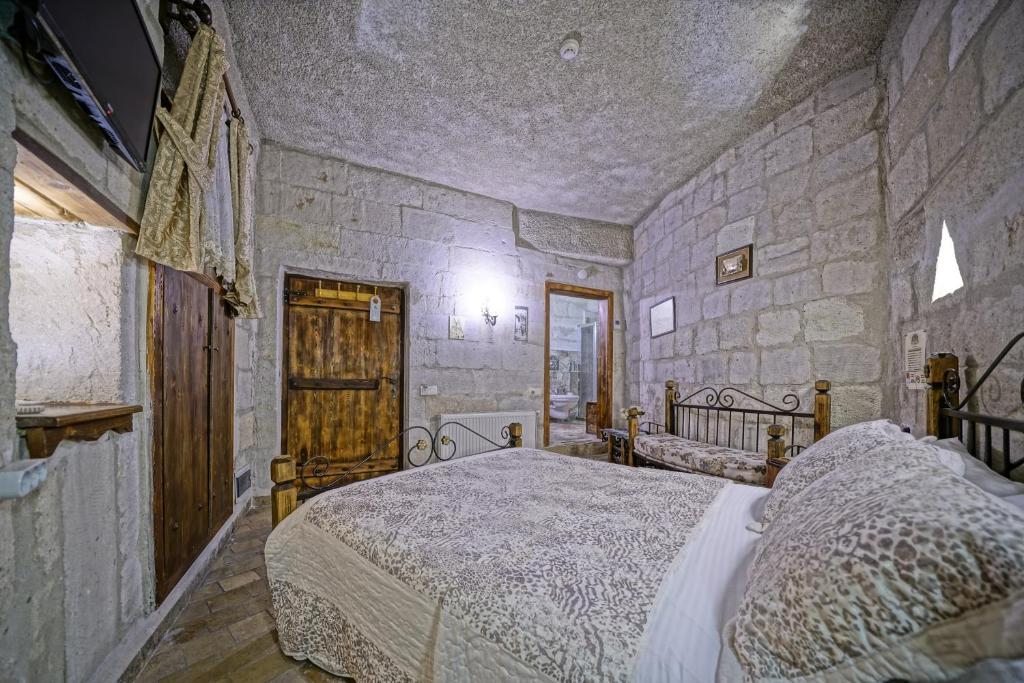 Двухместный (Улучшенный двухместный номер с 1 кроватью) отеля Maccan Cave Hotel, Гереме
