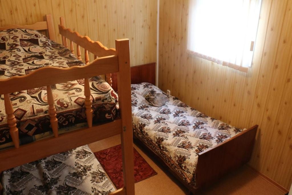 Номер (Дом с 4 спальнями) дома для отпуска  Андреевский Причал, Голубицкая