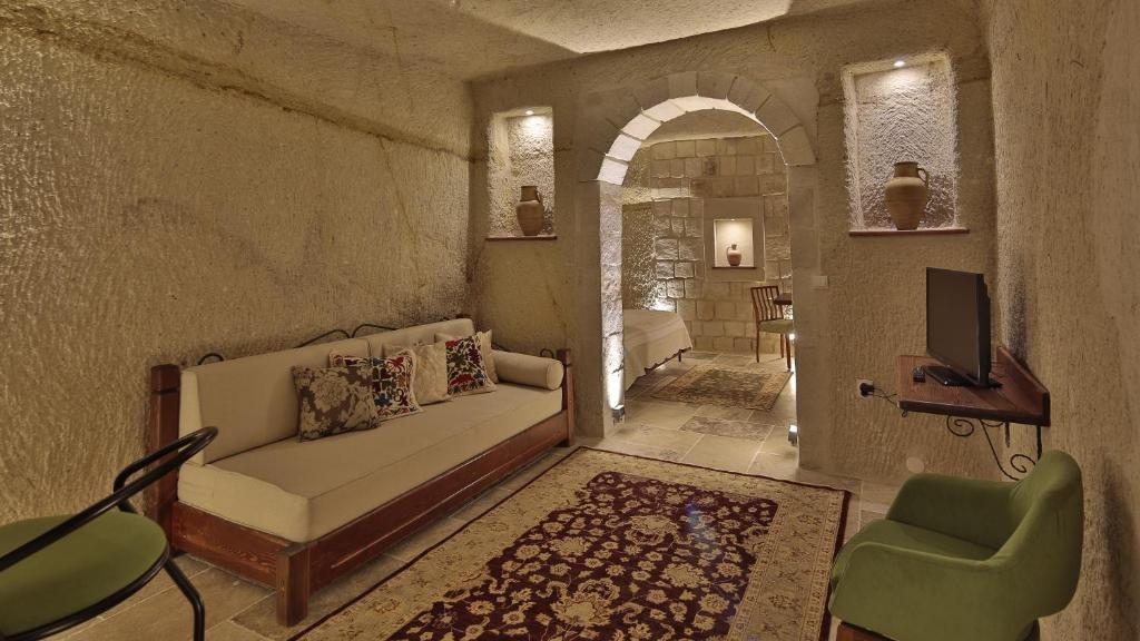 Четырехместный (Семейный номер «Делюкс Кейв») отеля Osmanbey Cave House, Гереме