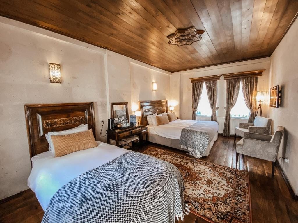 Двухместный (Двухместный номер Делюкс с 2 отдельными кроватями) отеля Osmanli Manor Hotel, Гереме