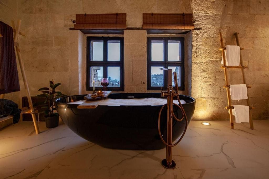 Двухместный (Двухместный номер Делюкс с 1 кроватью и ванной) отеля Sato Cave Hotel Cappadocia, Гереме