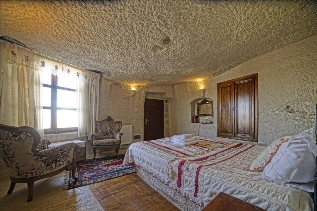 Двухместный (Двухместный номер Делюкс с 1 кроватью) отеля Village Cave House Hotel, Гереме