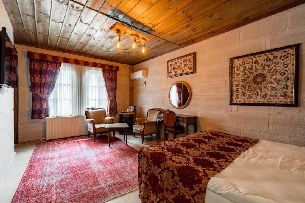 Двухместный (Двухместный каменный номер с 1 кроватью) отеля Amber Cave Suites, Гереме