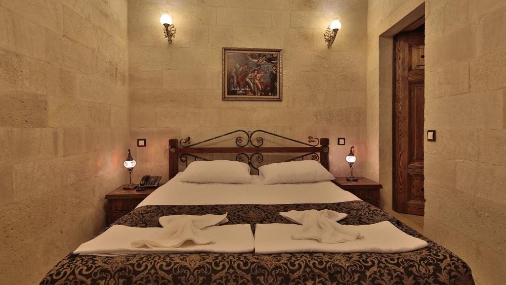 Двухместный (Двухместный номер Делюкс с 1 кроватью) отеля Cappadocia Cave Land Hotel, Гереме