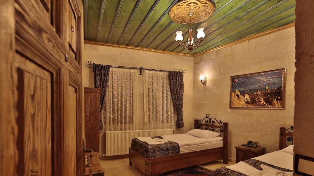 Двухместный (Двухместный номер Делюкс с 2 отдельными кроватями) отеля Cappadocia Cave Land Hotel, Гереме