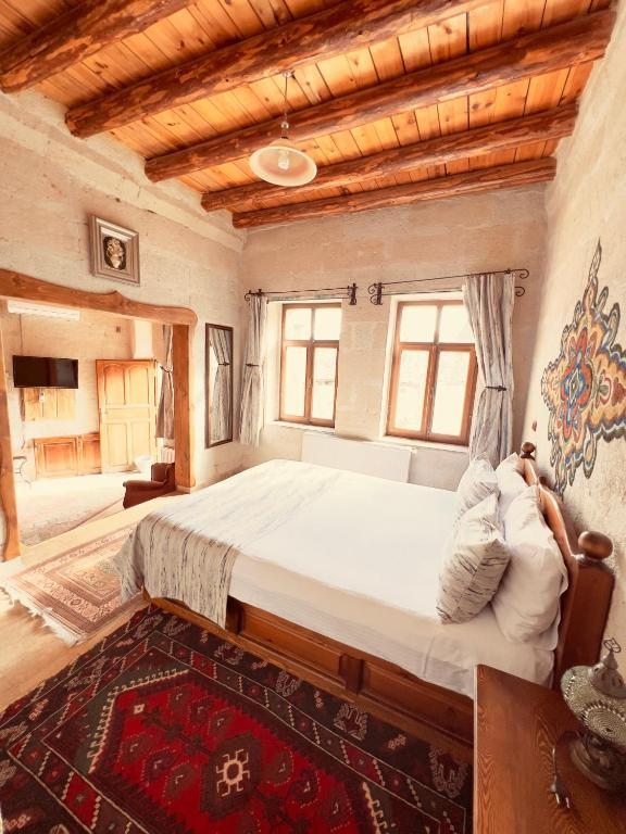 Двухместный (Каменный двухместный номер Делюкс с 1 кроватью), Chelebi Cave House Hotel