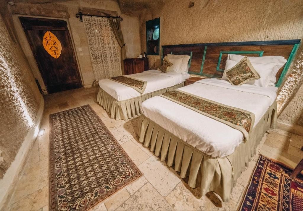 Двухместный (Двухместный номер в пещере с 2 отдельными кроватями) отеля Erenbey Cave Hotel, Гереме