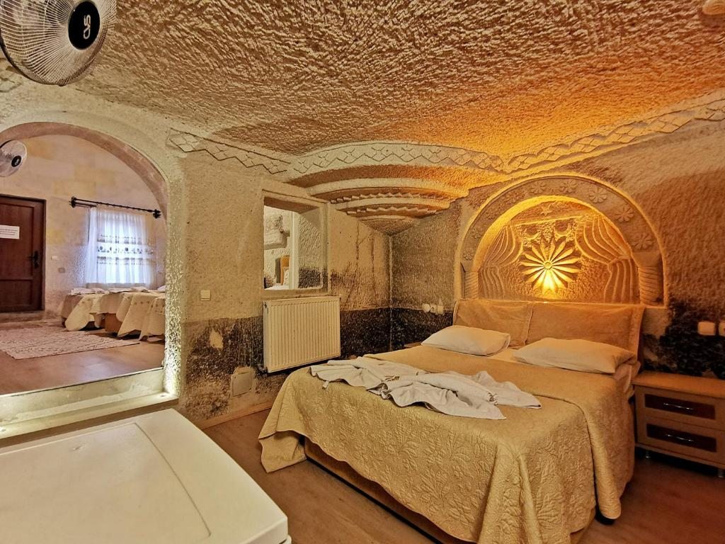 Сьюит (Люкс (для 5 взрослых)) отеля Falcon Cave Suites, Гереме