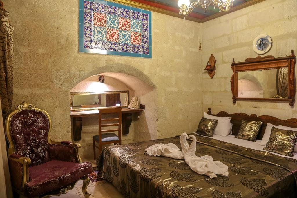 Двухместный (Каменный двухместный номер Делюкс с 1 кроватью), Goreme Palace Cave Hotel