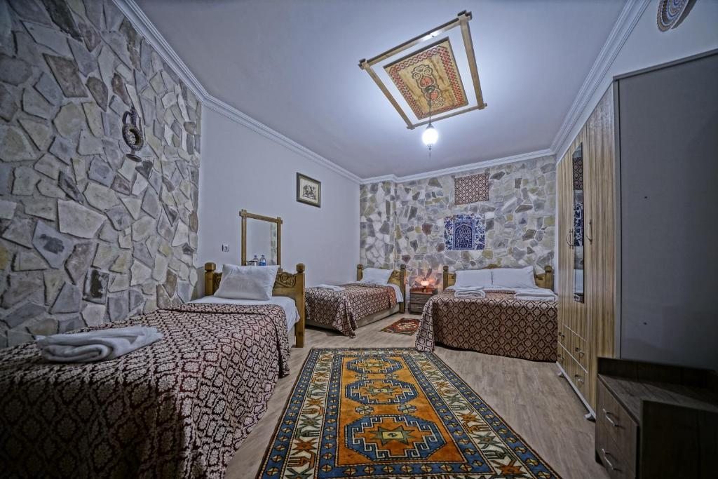 Четырехместный (Улучшенный номер Stone для 4 взрослых), Göreme Guest House