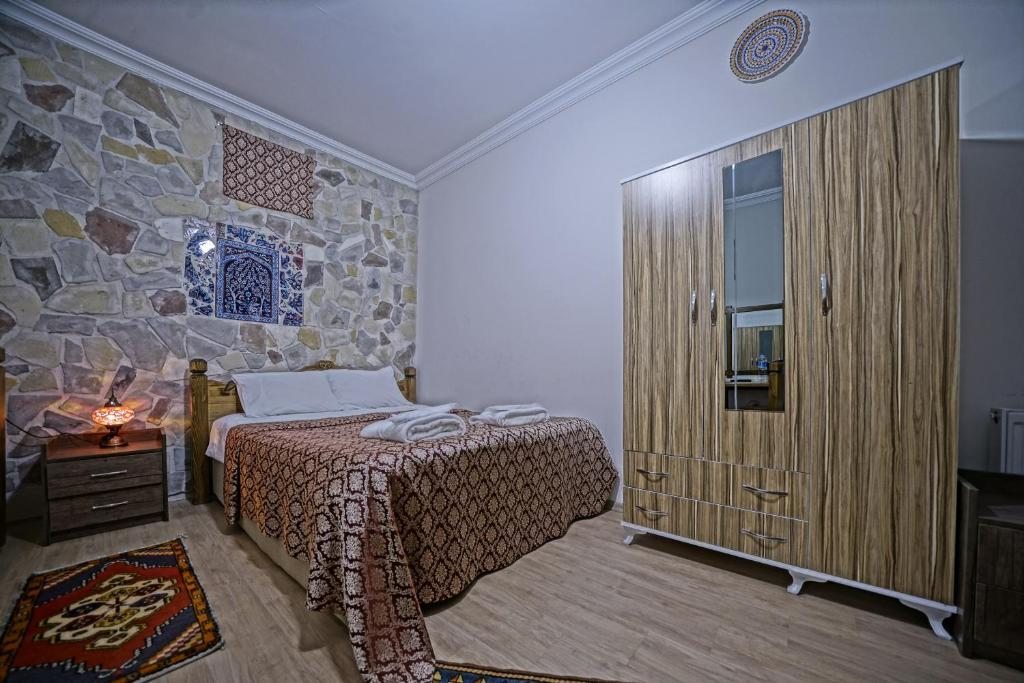 Четырехместный (Улучшенный номер Stone для 4 взрослых), Göreme Guest House