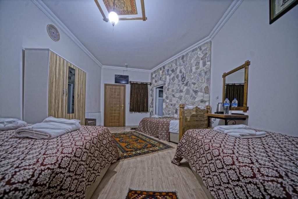 Четырехместный (Улучшенный номер Stone для 4 взрослых), Göreme Guest House