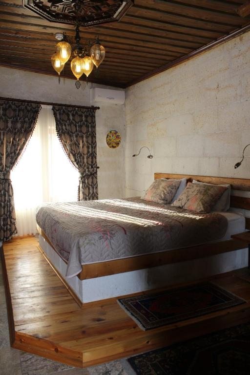 Двухместный (Двухместный номер Делюкс с 1 кроватью и ванной) отеля Hanzade Suites, Гереме