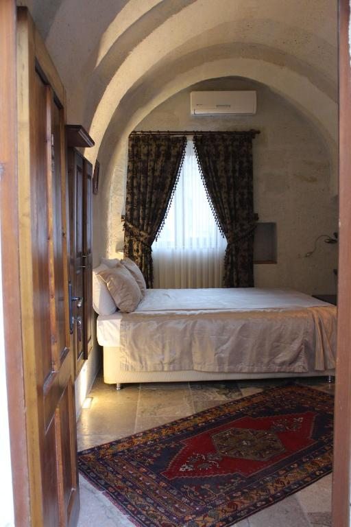 Двухместный (Двухместный номер Делюкс с 1 кроватью) отеля Hanzade Suites, Гереме